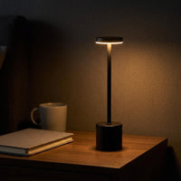 Touch lamp glowing with a warm white light in a cosy living room, feature image 2